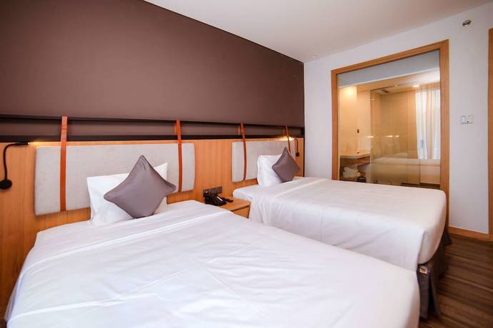 Imagen de la habitación del Hotel Dragon Style Hotel. Foto 17