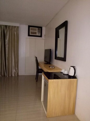 Imagen de la habitación del Hotel Dragonlink Suites. Foto 20