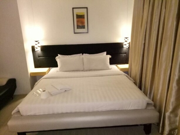 Imagen de la habitación del Hotel Dragonlink Suites. Foto 21