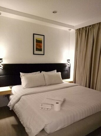 Imagen de la habitación del Hotel Dragonlink Suites. Foto 23