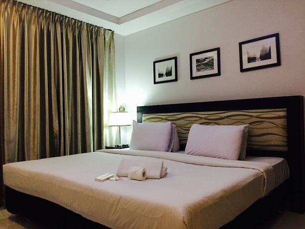 Imagen de la habitación del Hotel Dragonlink Suites. Foto 25