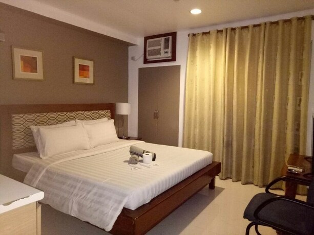 Imagen de la habitación del Hotel Dragonlink Suites. Foto 29