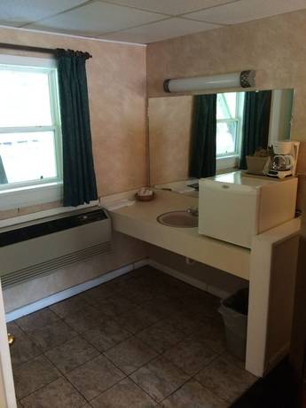 Imagen de la habitación del Hotel Drama Inn. Foto 2