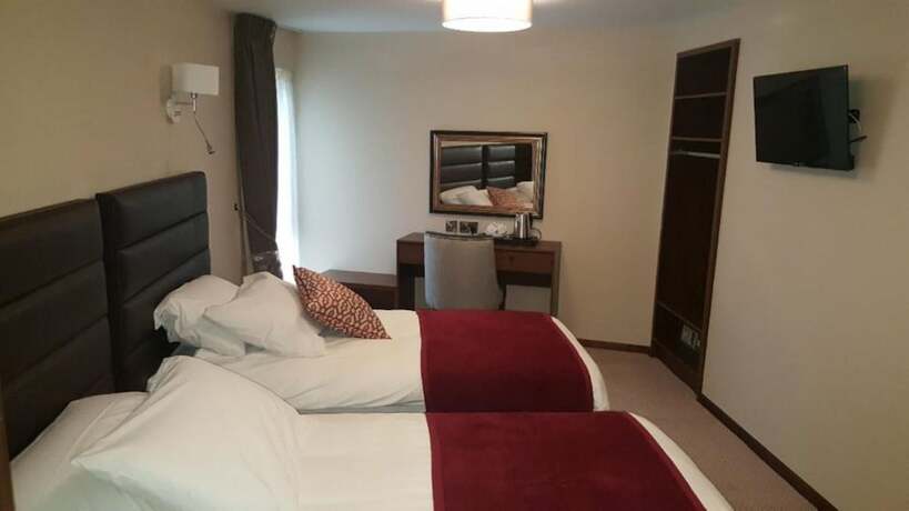Imagen de la habitación del Hotel Draper Rooms. Foto 17