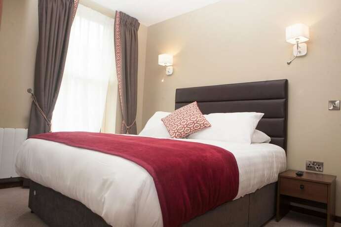 Imagen de la habitación del Hotel Draper Rooms. Foto 19