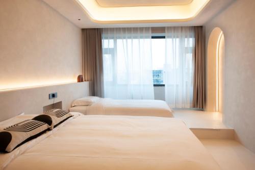 Imagen de la habitación del Hotel Dream Designer - Huimin Street Branch of Xi\'an Bell and Drum Tower. Foto 14