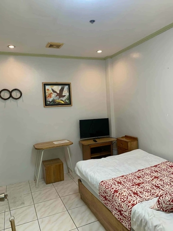 Imagen de la habitación del Hotel Dream Garden. Foto 4