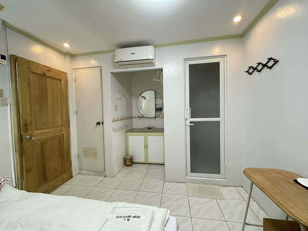 Imagen de la habitación del Hotel Dream Garden. Foto 8