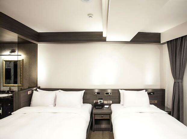 Imagen de la habitación del Hotel Dream Mansion. Foto 16