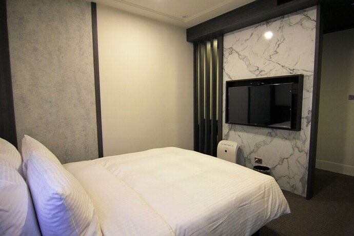 Imagen de la habitación del Hotel Dream Mansion. Foto 19