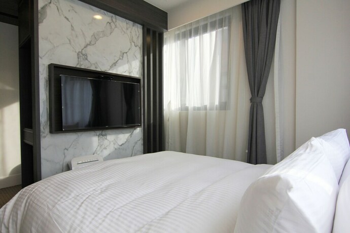 Imagen de la habitación del Hotel Dream Mansion. Foto 24