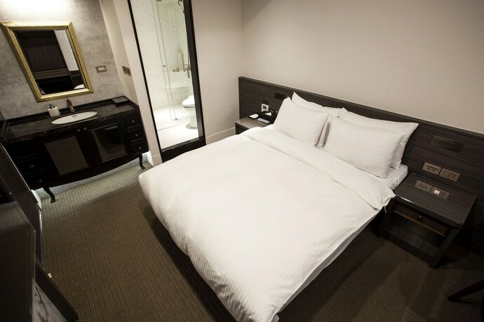 Imagen de la habitación del Hotel Dream Mansion. Foto 30