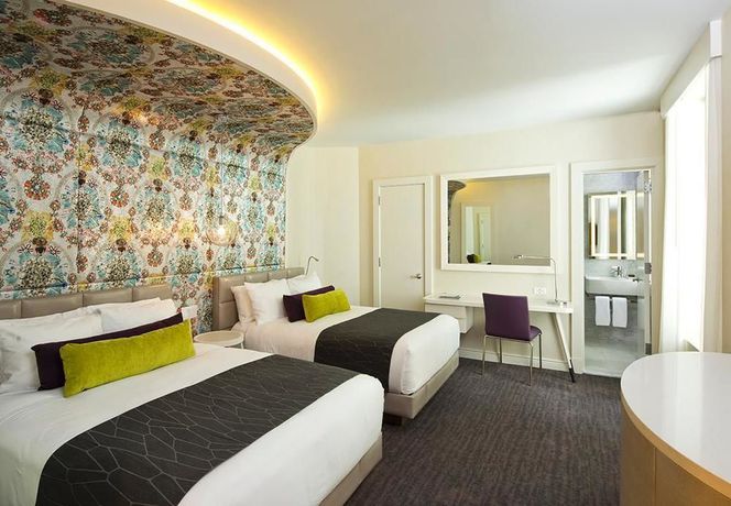 Imagen de la habitación del Hotel Dream Midtown. Foto 9