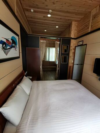 Imagen de la habitación del Hotel Dream Town. Foto 16