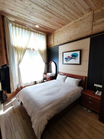 Imagen de la habitación del Hotel Dream Town. Foto 20