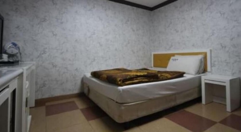 Imagen de la habitación del Hotel Dream of City Motel. Foto 2