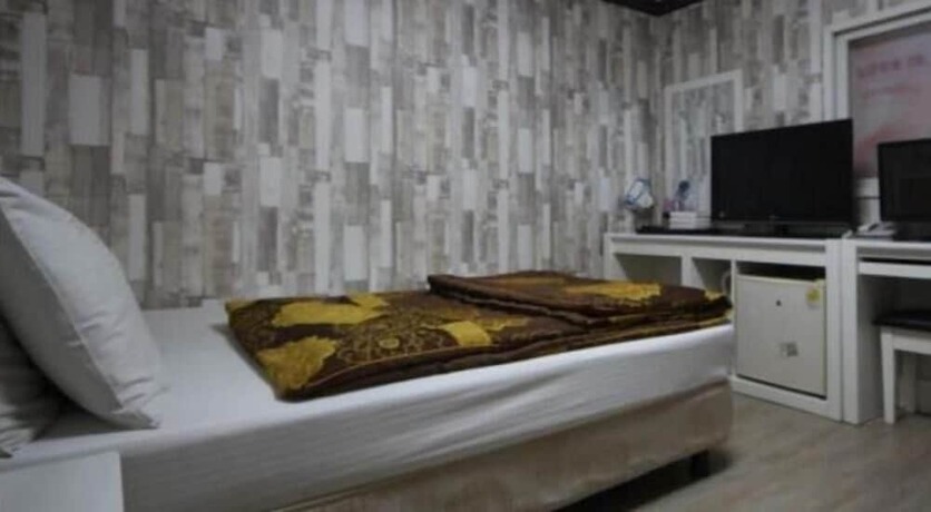Imagen de la habitación del Hotel Dream of City Motel. Foto 4