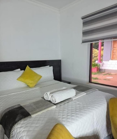 Imagen de la habitación del Hotel DreamWest Living Guesthouse. Foto 6