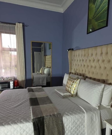 Imagen de la habitación del Hotel DreamWest Living Guesthouse. Foto 8