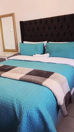 Imagen de la habitación del Hotel DreamWest Living Guesthouse. Foto 9