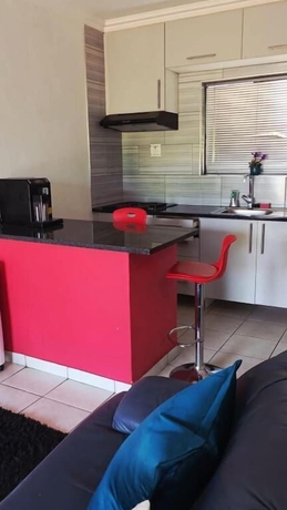 Imagen de la habitación del Hotel DreamWest Living Guesthouse. Foto 10