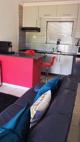 Imagen de la habitación del Hotel DreamWest Living Guesthouse. Foto 11