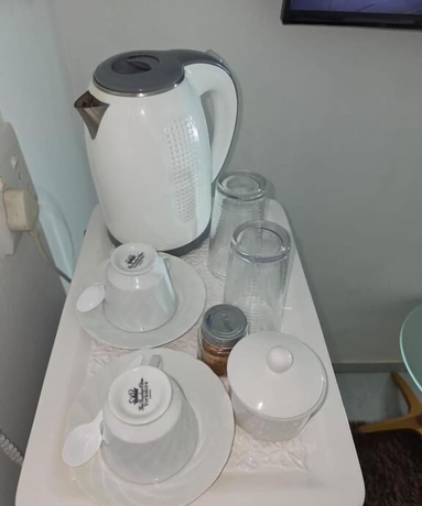 Imagen de la habitación del Hotel DreamWest Living Guesthouse. Foto 13