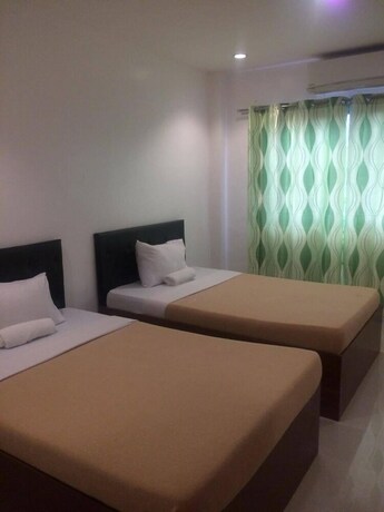 Imagen de la habitación del Hotel Dreamland Residences. Foto 12