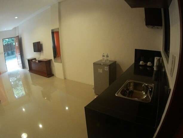 Imagen de la habitación del Hotel Dreamland Residences. Foto 17