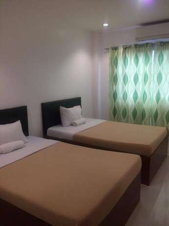 Imagen de la habitación del Hotel Dreamland Residences. Foto 19