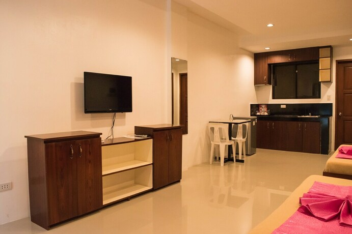 Imagen de la habitación del Hotel Dreamland Residences. Foto 20