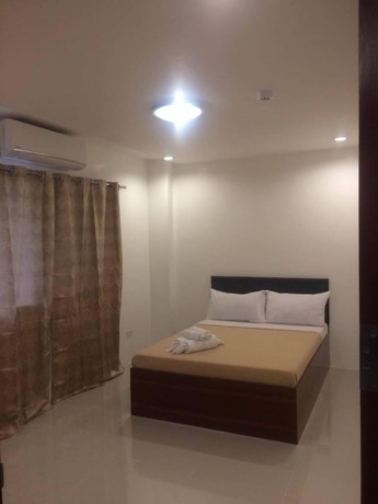 Imagen de la habitación del Hotel Dreamland Residences. Foto 21