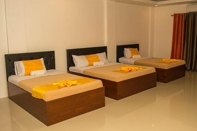 Imagen de la habitación del Hotel Dreamland Residences. Foto 23