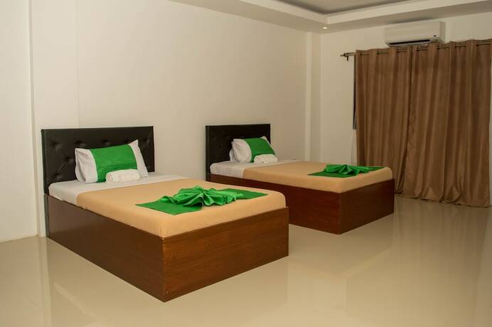 Imagen de la habitación del Hotel Dreamland Residences. Foto 26