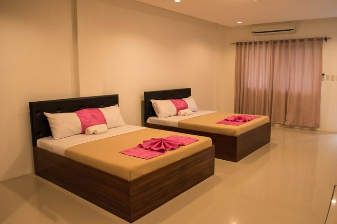 Imagen de la habitación del Hotel Dreamland Residences. Foto 31