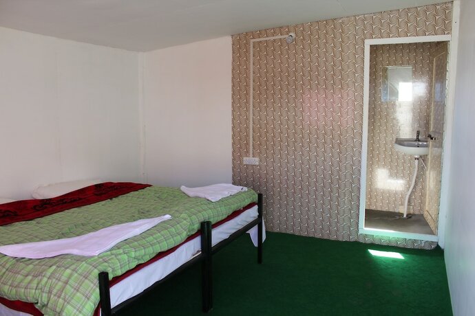 Imagen de la habitación del Hotel Dreamland Wooden Cottage. Foto 4