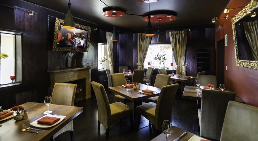 Imagen del bar/restaurante del Hotel Dreams Boutique. Foto 3