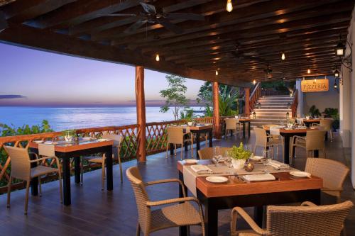 Imagen del bar/restaurante del Hotel Dreams Cozumel Cape Resort and Spa - All Inclusive. Foto 8
