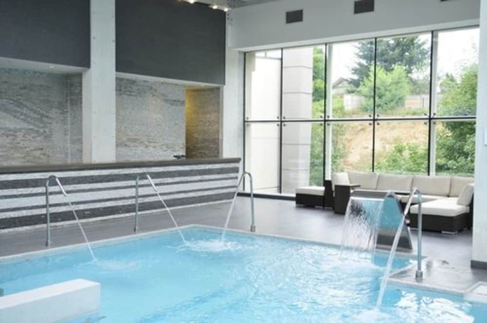 Imagen de la piscina del Hotel Dreams De Los Volcanes - Puerto Varas. Foto 8