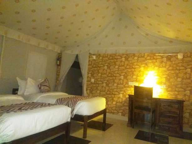 Imagen de la habitación del Hotel Dreams Resort Udaipur, Udaipur. Foto 11