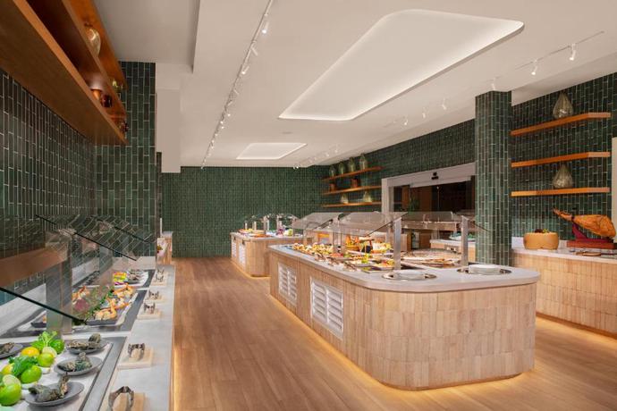 Imagen del bar/restaurante del Hotel Dreams Sapphire Resort and Spa - All Inclusive. Foto 6