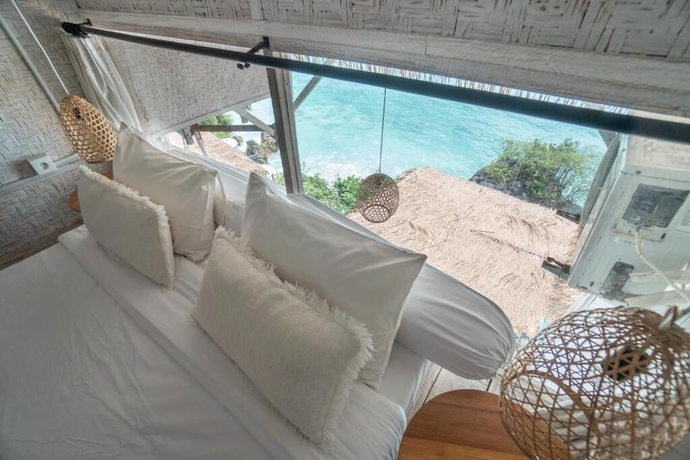 Imagen de la habitación del Hotel Dreamsea Uluwatu. Foto 7