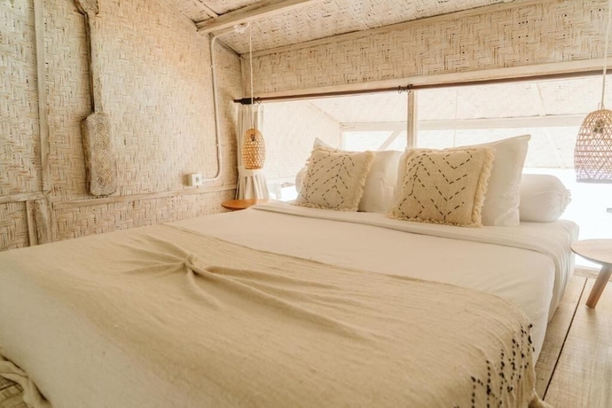 Imagen de la habitación del Hotel Dreamsea Uluwatu. Foto 13