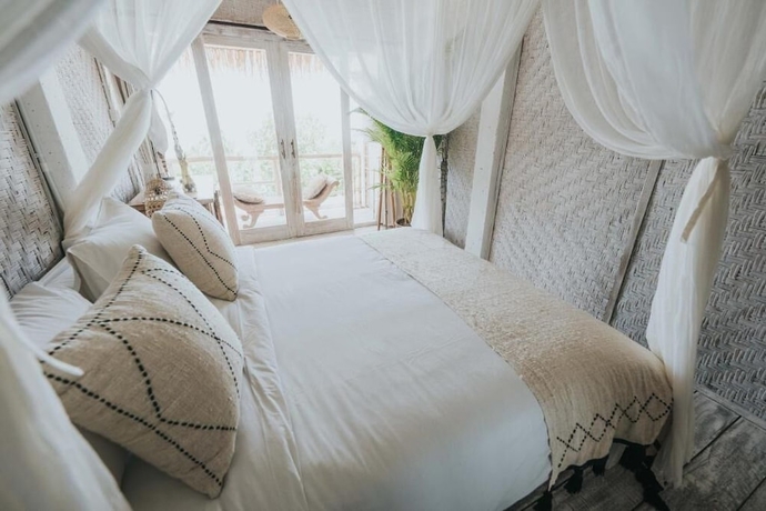 Imagen de la habitación del Hotel Dreamsea Uluwatu. Foto 15