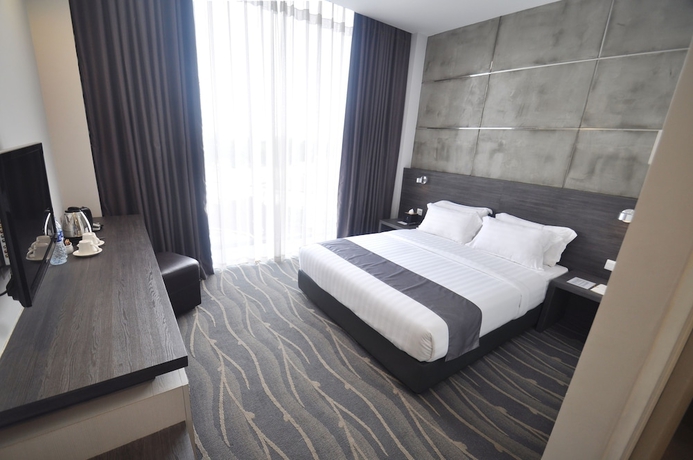 Imagen de la habitación del Hotel Dreamtel Jakarta. Foto 3