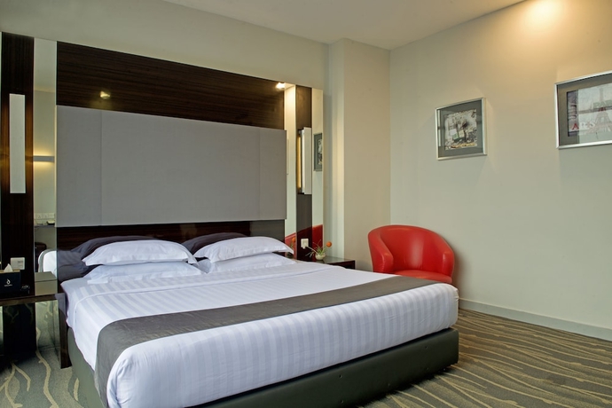 Imagen de la habitación del Hotel Dreamtel Jakarta. Foto 4