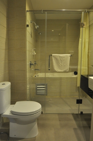 Imagen de la habitación del Hotel Dreamtel Jakarta. Foto 5