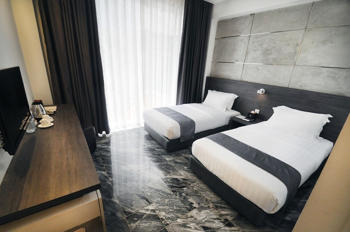 Imagen de la habitación del Hotel Dreamtel Jakarta. Foto 6