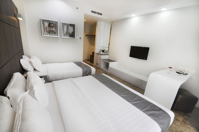 Imagen de la habitación del Hotel Dreamtel Jakarta. Foto 8
