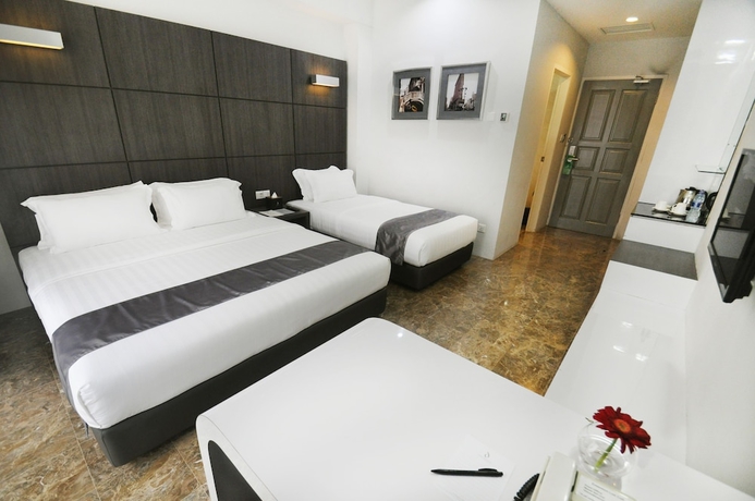 Imagen de la habitación del Hotel Dreamtel Jakarta. Foto 9